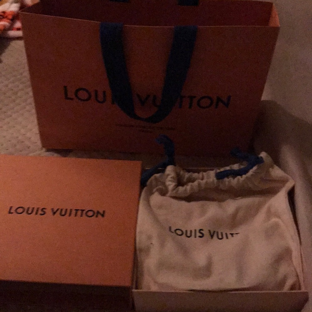 Louie Vuitton belt.  Box bag and receipt